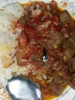 A picture of Liver stew and rice.