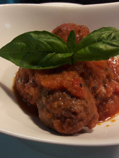 A picture of Meatballs in tomato concase.