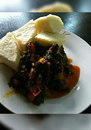 A picture of Yam with palmoil sauce.