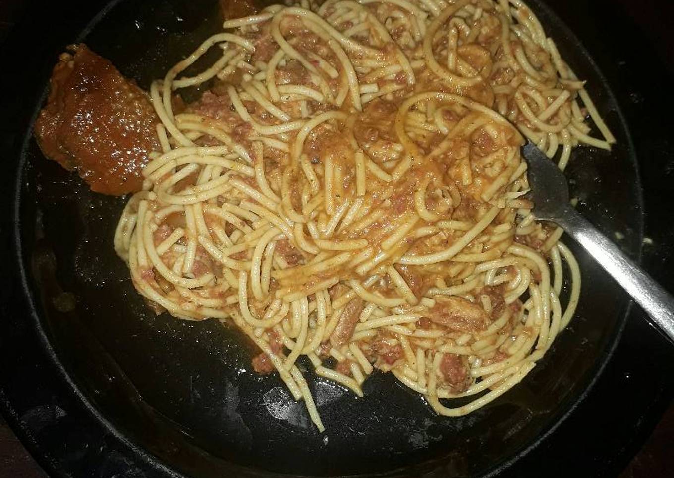 Jollof spaghetti and chicken