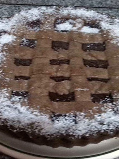 Una foto de Pasta frola con masa de chocolate🍫👩🏼🍳