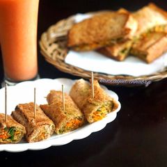 A picture of Carrot vermicelli stuffed sandwich roll.