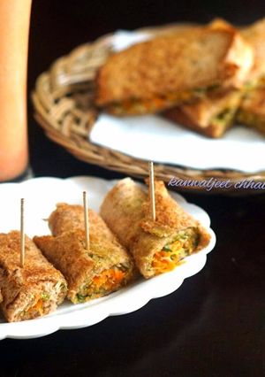 A picture of Carrot vermicelli stuffed sandwich roll.
