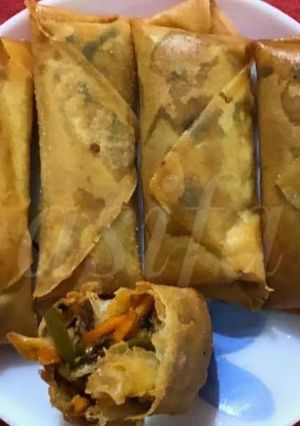 A picture of Schezwan Chicken spring roll.