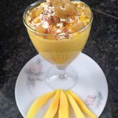 A picture of Mango dry fruit lassi.