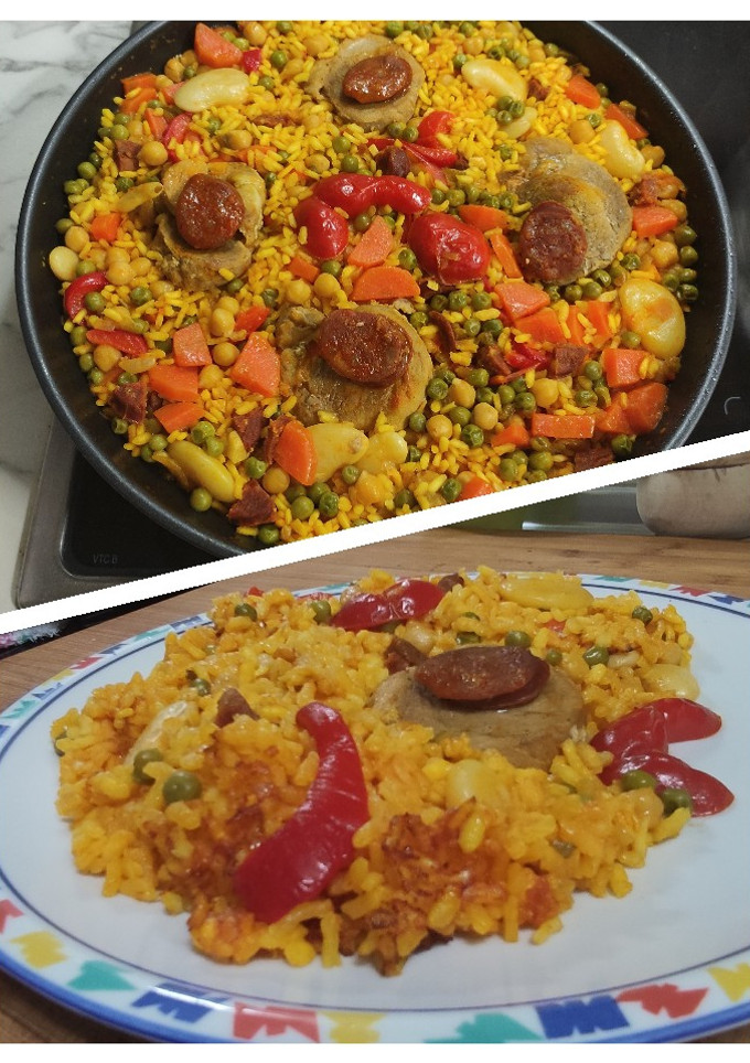 Una foto de Arroz con solomillo de cerdo, chorizo y verduritas.🍚🐖🫑🍅🥕
