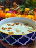 Khira gaintha (Rice flour balls in flavoured thick milk mixture)