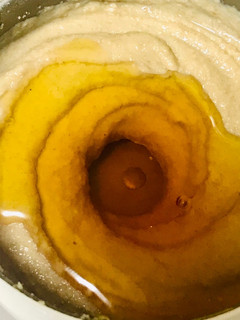 A picture of Olive oil and honey homemade peanut butter.