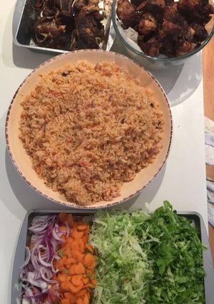 A picture of Jollof Rice, goat meat & Turkey.