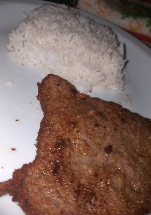 Una foto de Milanesas Con Arroz