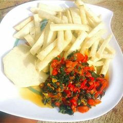 A picture of Fried yam with vegetable sauce.