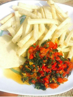 A picture of Fried yam with vegetable sauce.