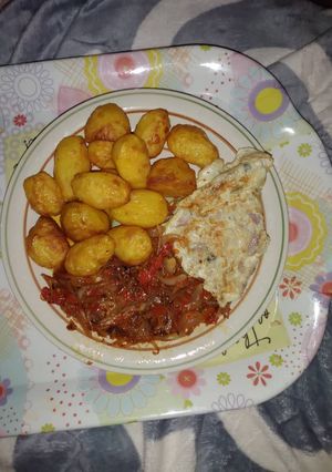 A picture of Potato with fried egg.