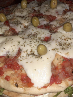 Una foto de Mi hamburpizza... 🍔🍕