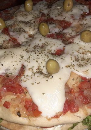 Una foto de Mi hamburpizza... 🍔🍕