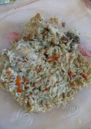 Una foto de Arroz con pollo 😋