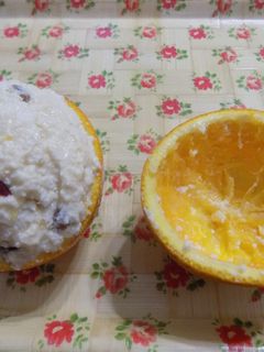 Una foto de Naranjas rellenas con ricota dulce