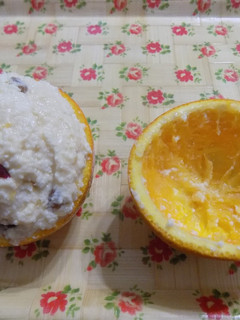 Una foto de Naranjas rellenas con ricota dulce