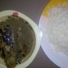 A picture of White rice and Fresh fish pepper soup.