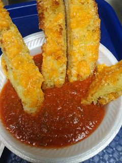 A picture of Ciabatta Bread Sticks and Sauce.