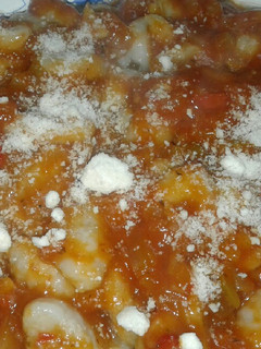 Una foto de Ñoquis con salsa