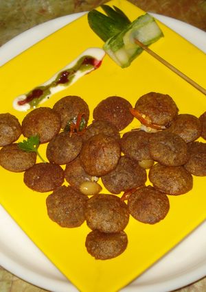 A picture of Kooto atta - button idli pakora.