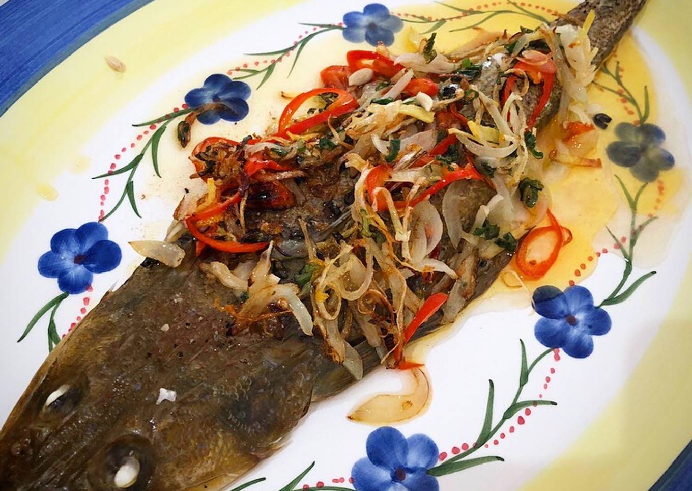 Whole baked fish with fragrant chilli onion oil