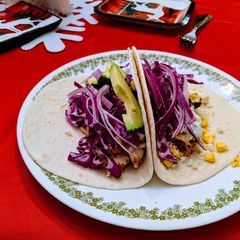 A picture of Grilled Cilantro Lime Corn Chicken Avocado Tacos.