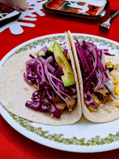 A picture of Grilled Cilantro Lime Corn Chicken Avocado Tacos.