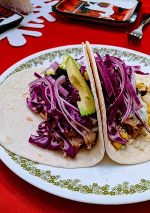 A picture of Grilled Cilantro Lime Corn Chicken Avocado Tacos.