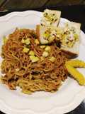 Spaghetti with marinara sauce with cheese corn toast