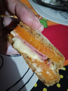 Una foto de Milanesa de calabaza rellena