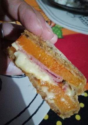 Una foto de Milanesa de calabaza rellena
