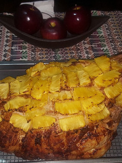 Una foto de Pierna de cerdo en salsa de piña y naranja