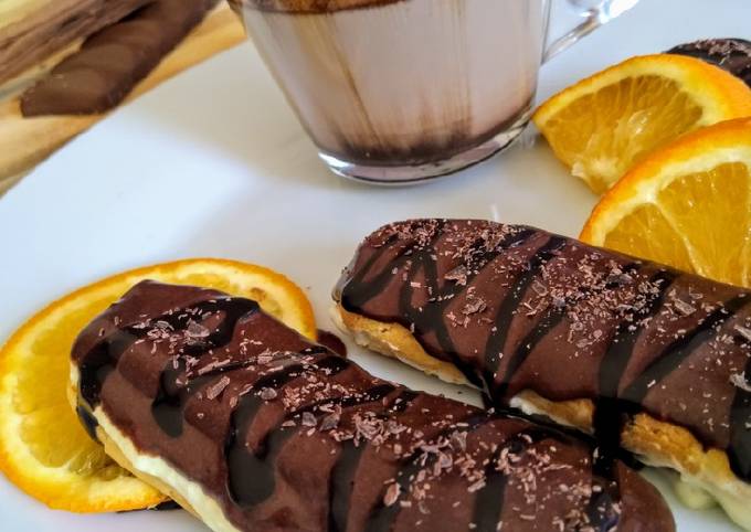 Choco orange eclair with fresh cream...cup of hot chocolate