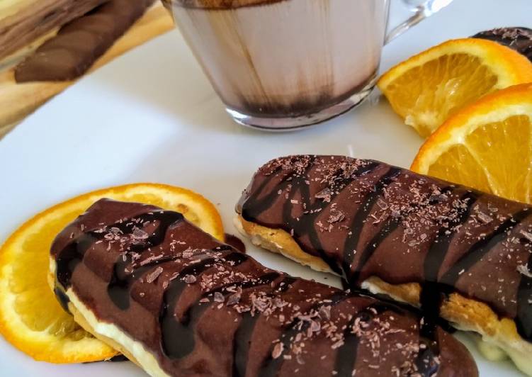 Choco orange eclair with fresh cream&hellip;cup of hot chocolate