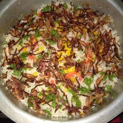 A picture of 3 layered Mutton biryani.