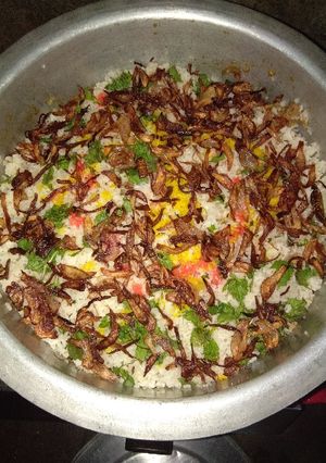A picture of 3 layered Mutton biryani.
