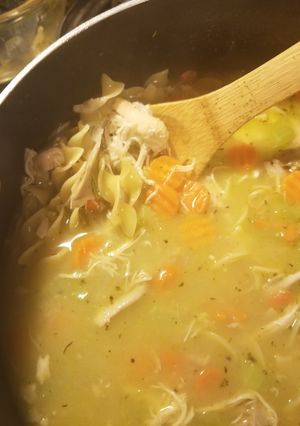 A picture of Chicken soup (with bones).