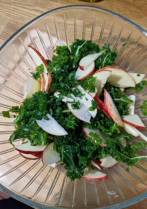 A picture of Raw curly kale and apple salad.