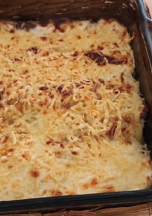Una foto de Lasaña de gulas y champiñones