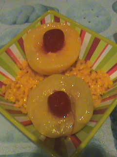 Una foto de Arroz con melocotón y guindas