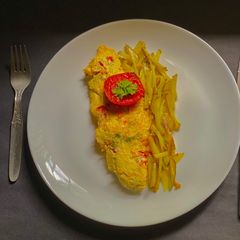 A picture of Masala Omelette- Indian styled quick breakfast.