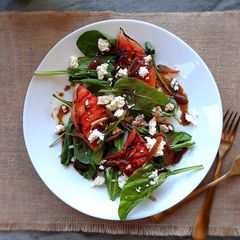 A picture of Grilled watermelon salad with honey balsamic vinaigrette.