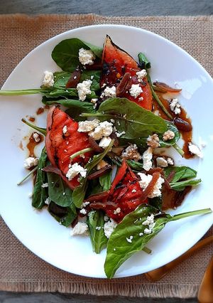 A picture of Grilled watermelon salad with honey balsamic vinaigrette.