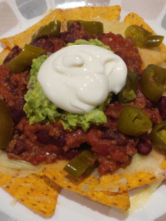 Una foto de Nachos con guacamole