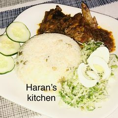 A picture of White rice and stew.