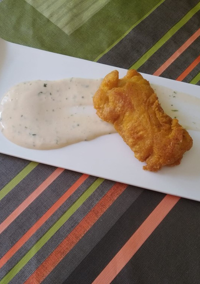 Una foto de Merluza en tempura de cerveza con mayonesa alljulivert