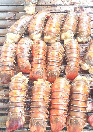 Una foto de Langostas a la parrilla
