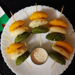 A picture of Tri colour Rava idli.